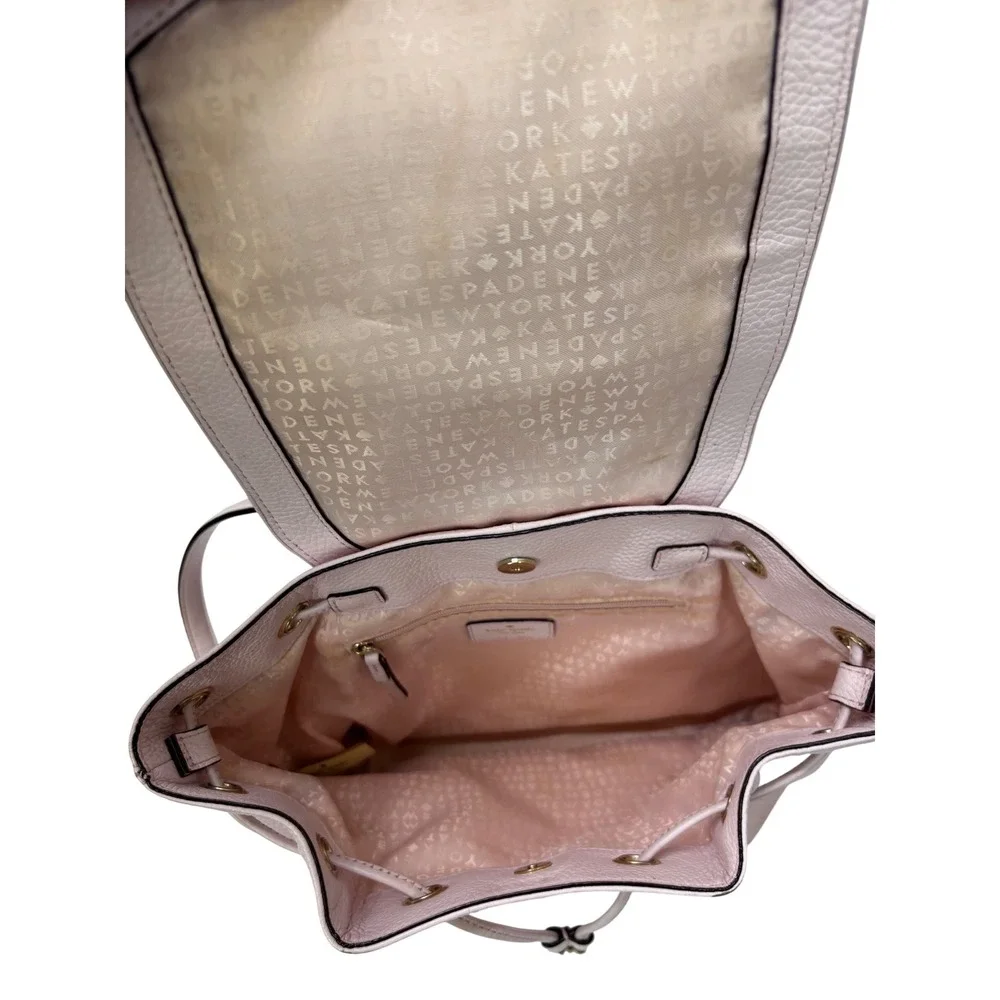 Kate Spade New York Pebbled Leather Drawstring Backpack Lavender Pink Gold Tone